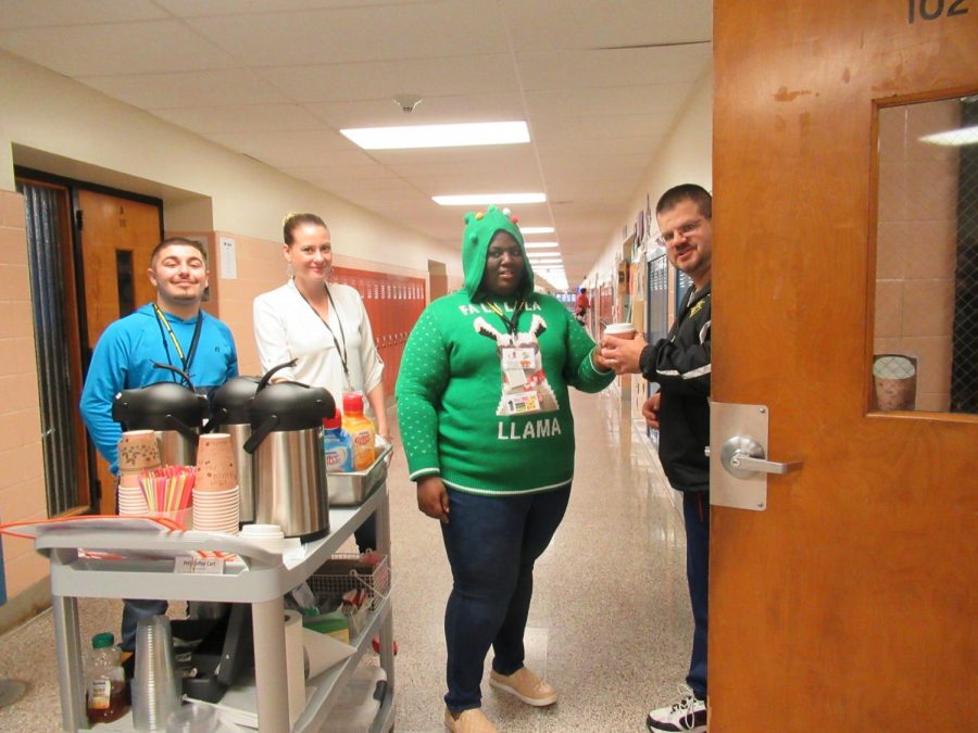 Jonah, Ahmed, and Mrs. Mengak are delivering Mr. Viola his cup of coffee from the Brew cart.