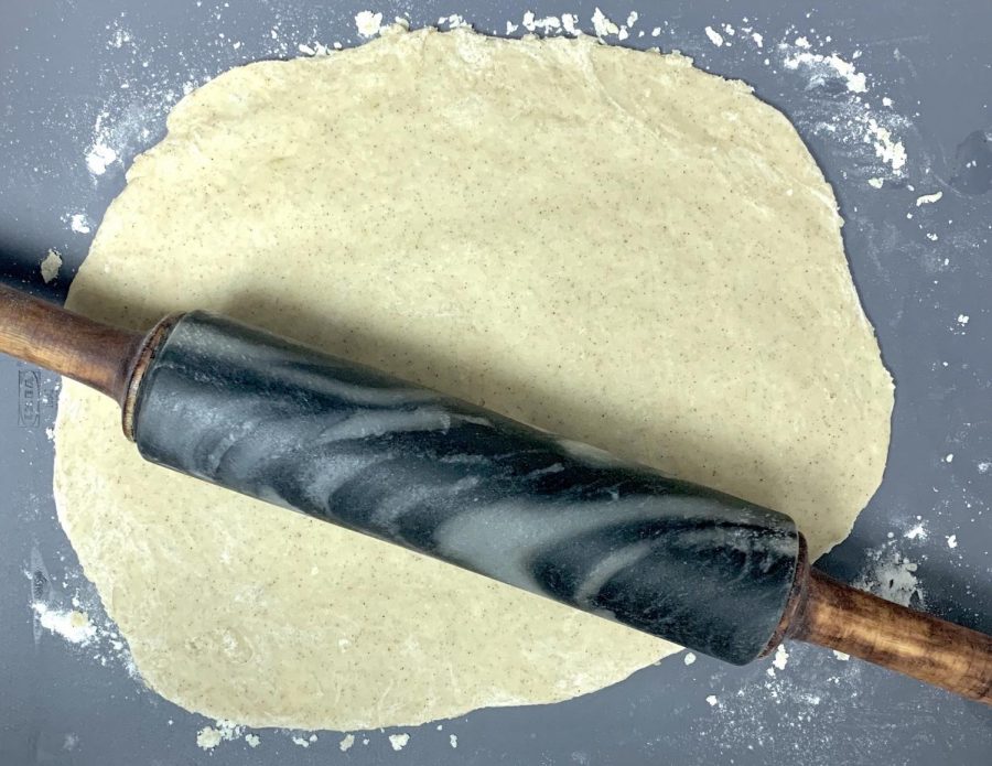 Lightly flour your work surface again and roll the dough into a 10x14-inch rectangle.