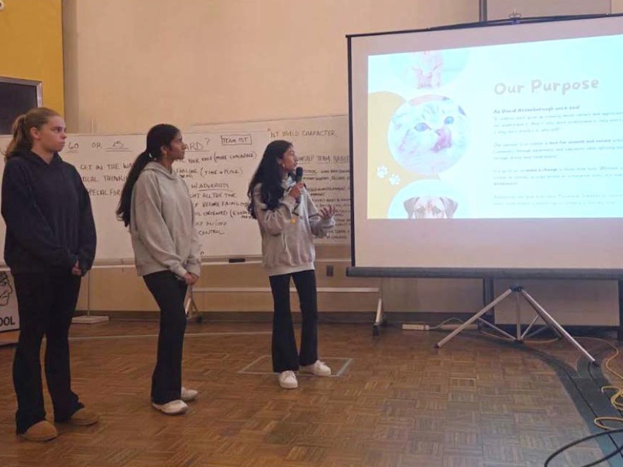 Students present at Pway Paws meeting