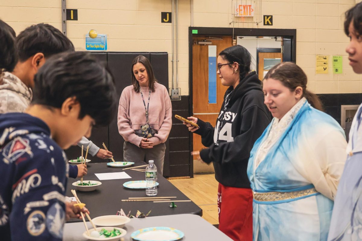 Mentors assist with the stations