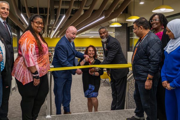 Piscataway administration and Board of Education members cut the ribbon to open the media center!
